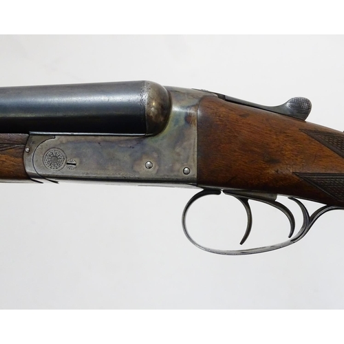 632 - Shotgun: A 12 bore side by side boxlock ejector shotgun by H. E. Akrill, Beverley.  28'' fixed choke... 