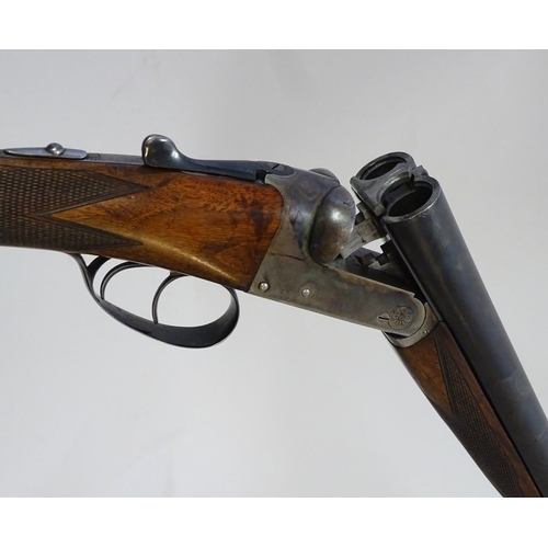 632 - Shotgun: A 12 bore side by side boxlock ejector shotgun by H. E. Akrill, Beverley.  28'' fixed choke... 