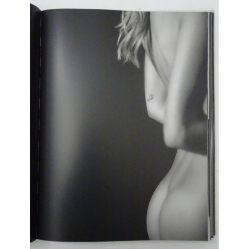 174 - ANGELS -  A book of portrait studies of women by the photographer Russell James; 154pp, cellophane p... 