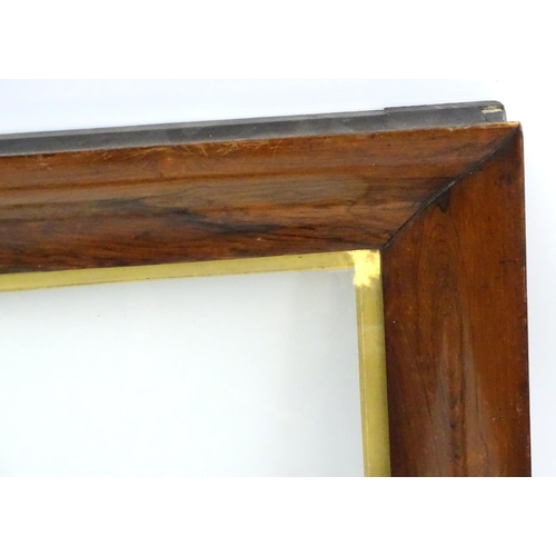 180 - A 19 thC Rosewood wide moulded frame with gilt slip and glass. Internal measurement 20 3/4'' square ... 