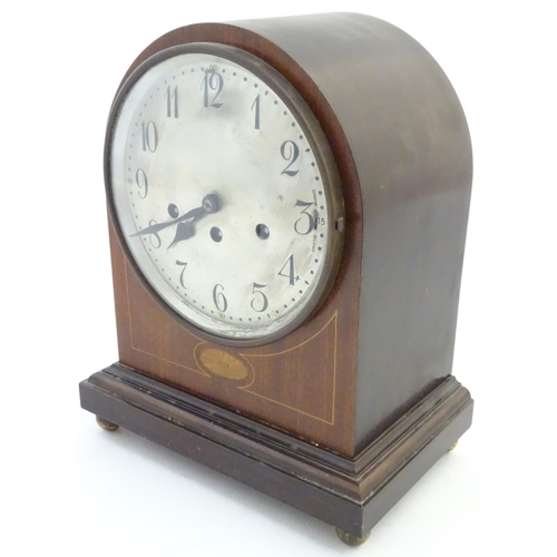 Junghans arch shaped 3 train mantle clock a Westminster chime