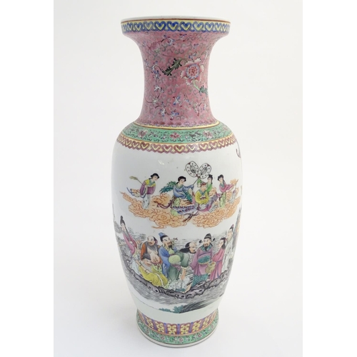 1 - A large 20thC Chinese famille rose vase decorated with imperial figures and elders surrounded by peo... 