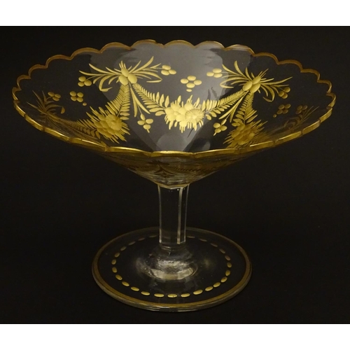 104 - St Louis : a pedestal tazza like bonbon dish with gilt decoration and an octagonal shaft, 4 1/4'' hi... 