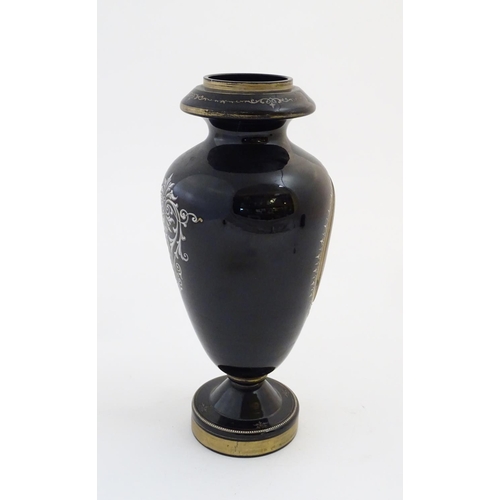 107 - A black memorial glass vase decorated with a portrait of a high ranking German officer / military ge... 