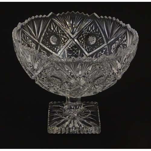 110 - Glass :a cut and pressed moulded lead glass pedestal bowl/tazza with octagonal stem and squared foot... 