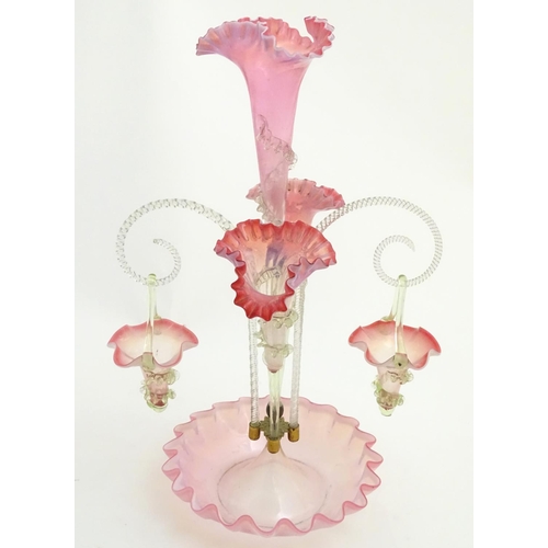 121 - Victorian Vaseline Cranberry Glass Epergne/centrepiece: a flared wavy rim base with two clear barley... 