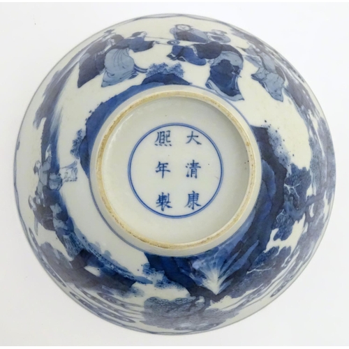 13 - A 19thC Chinese blue and white bowl depicting figures in a landscape. Approx. 2 3/4'' high x 7 1/2''... 