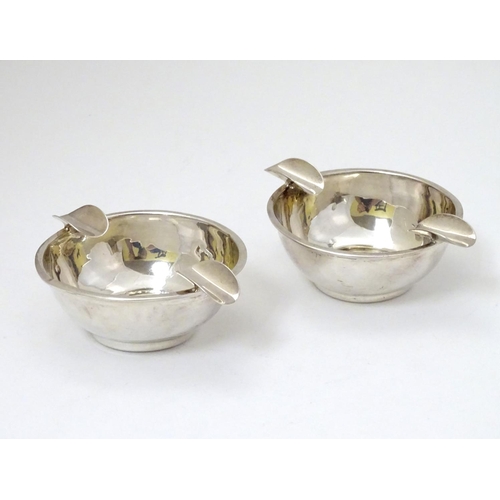 130 - A pair of silver ashtrays hallmarked Birmingham 1939 maker Barker Brothers Silver Ltd. 4'' wide over... 