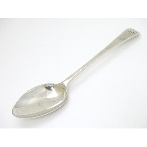 131 - A Geo III silver old English pattern table spoon hallmarked London 1776 maker TC 8 3/4''  long (68g)