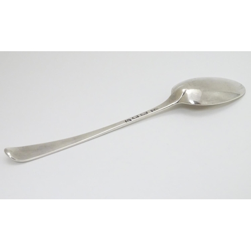 131 - A Geo III silver old English pattern table spoon hallmarked London 1776 maker TC 8 3/4''  long (68g)