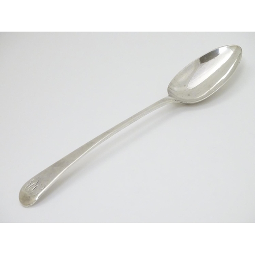 131 - A Geo III silver old English pattern table spoon hallmarked London 1776 maker TC 8 3/4''  long (68g)