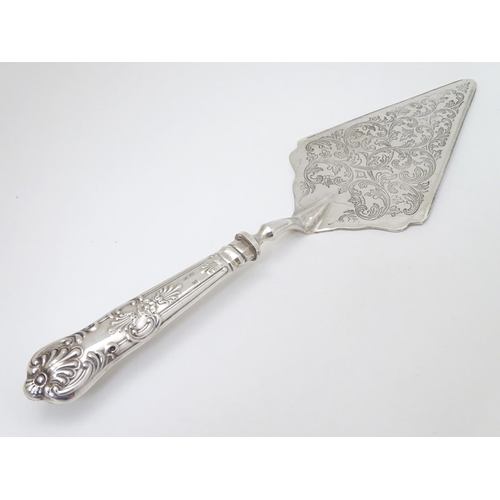 133 - A silver handled pastry server. 11 1/2'' long