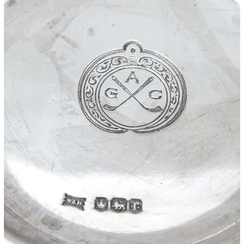 138 - A silver ash tray with engraved crossed golf club emblem titled AGC. Hallmarked Sheffield 1934 maker... 