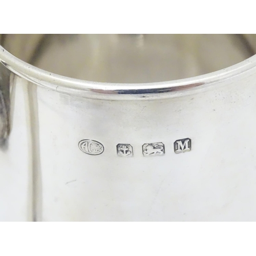 139 - A silver tankard hallmarked Birmingham 1936 maker Alexander Clarke Co. Ltd. 3 3/4'' long (160g)