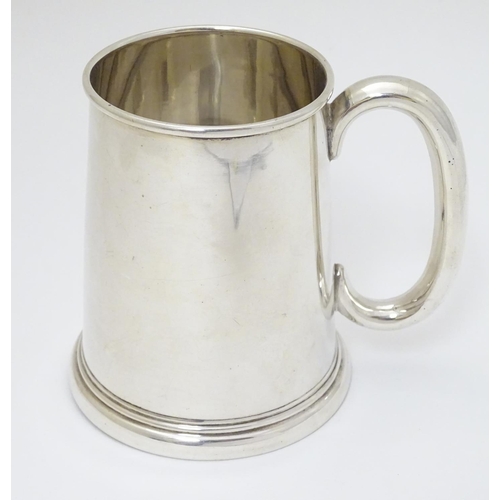 139 - A silver tankard hallmarked Birmingham 1936 maker Alexander Clarke Co. Ltd. 3 3/4'' long (160g)