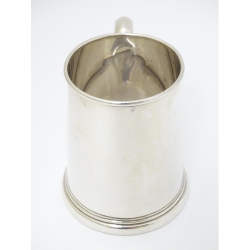 139 - A silver tankard hallmarked Birmingham 1936 maker Alexander Clarke Co. Ltd. 3 3/4'' long (160g)