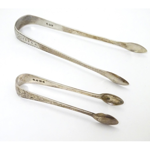 141 - Geo III silver sugar tongs with bright cut decoration, hallmarked London 1805 maker Samuel Godbehere... 