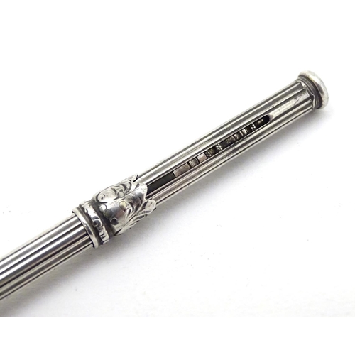 149 - A 19thC  white metal pencil set with engraved rock crystal seal to end. Approx 5'' long