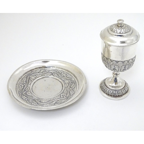 151 - A white metal chalice and cover 5'' high  together with a paten 5 1/4'' diameter (2)