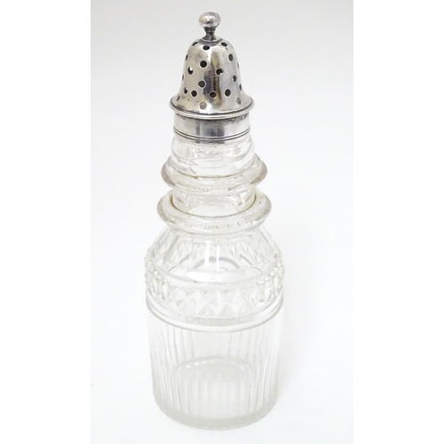 157 - A cut glass pepperette with silver top hallmarked London 1864 maker George John Richards & Edward Ch... 