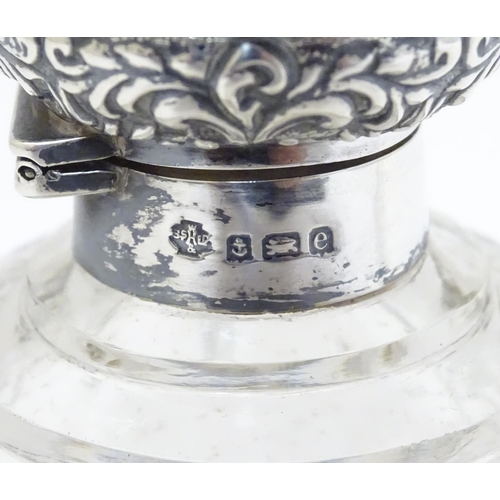 158 - A cut glass scent / perfume bottle with silver top hallmarked Birmingham 1904 4 1/2'' high overall