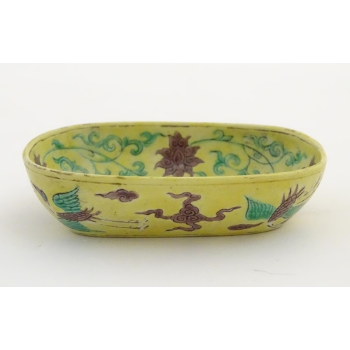 16 - A small Chinese dish decorated with stylised birds, clouds and flowers. Character marks to base. App... 