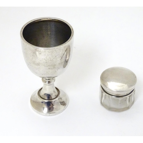 162 - A silver egg cup hallmarked Birmingham 1935 maker S Blanckensee & Son Ltd. 3 1/8'' high Together wit... 