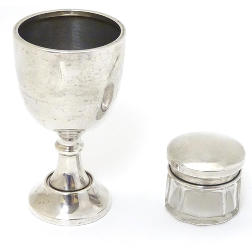 162 - A silver egg cup hallmarked Birmingham 1935 maker S Blanckensee & Son Ltd. 3 1/8'' high Together wit... 