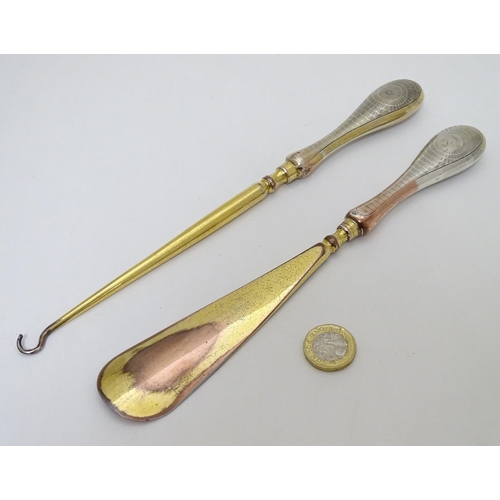 164 - Silver handled button hook and shoe horn with engine turned decoration and traces of gilding. Hallma... 