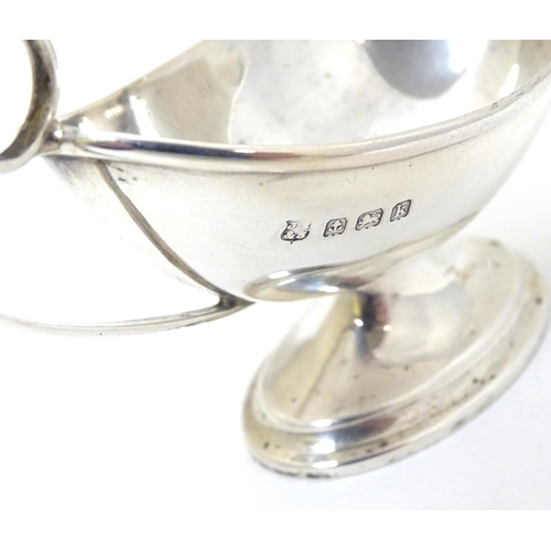 170 - A cased pair of silver pedestal table salts. Hallmarked Birmingham 1909 maker J Sherwood & Sons.  To... 