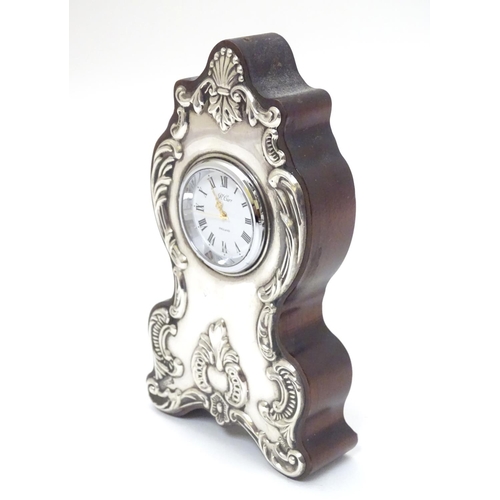 175 - A mantle clock with silver mounts hallmarked Sheffield 1988 maker Carrs of Sheffield 5 1/4'' high