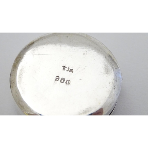 180 - A Continental white metal pill box of circular form 1 1/4'' diameter