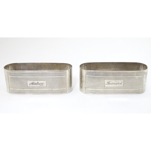 182 - A pair of silver napkin rings with engine turned decoration hallmarked Birmingham 1950 maker John Ro... 