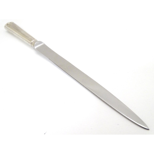 184 - A silver handled paper knife 8 1/2'' long