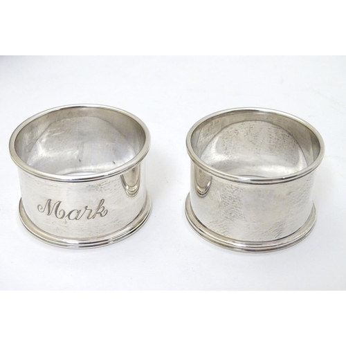 192 - A cased pair of silver napkin rings hallmarked Birmingham 1954/1956 maker Adie Bros Ltd.