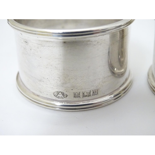 192 - A cased pair of silver napkin rings hallmarked Birmingham 1954/1956 maker Adie Bros Ltd.