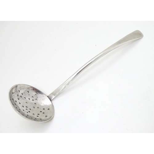 200 - A silver sifter spoon hallmarked London 1991 maker SP. 5 1/2'' long (28g)