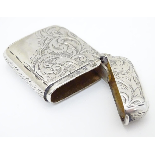 201 - A silver vesta case with engraved decoration hallmarked Birmingham 1896 maker Rolason Brothers 1 3/4... 