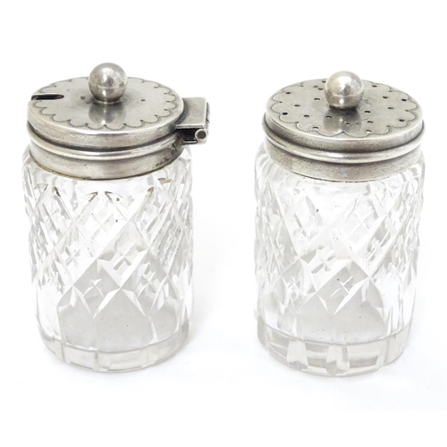 202 - Cut glass pepper pot and mustard pot with silver tops hallmarked  Birmingham 1906 maker William Deve... 