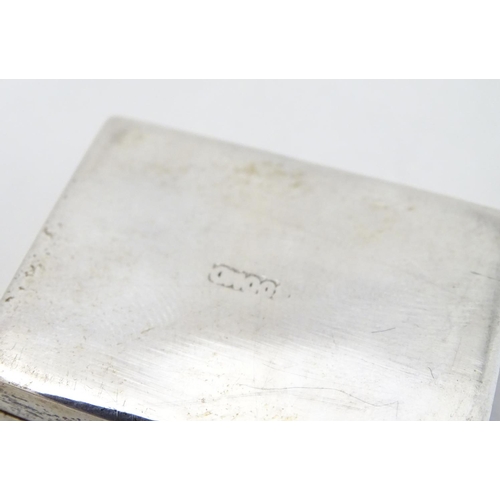 204 - A white metal box of rectangular form with hinged lid.  1 3/4'' x 1 1/4'' x 3/8''