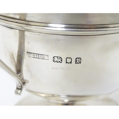 210 - A twin handled trophy cup hallmarked London 1932 maker Sir John Bennett Ltd. (126g)