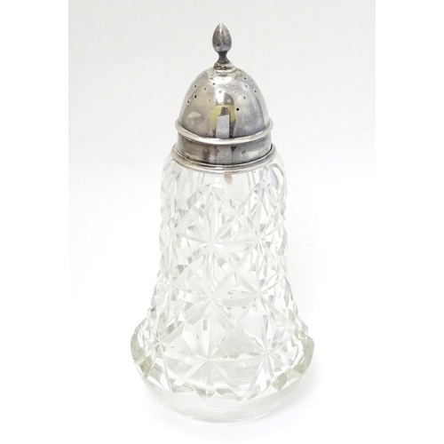 211 - A cut glass sugar shaker / caster with silver top hallmarked Birmingham 1931 maker S. Blanckensee & ... 