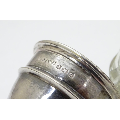 211 - A cut glass sugar shaker / caster with silver top hallmarked Birmingham 1931 maker S. Blanckensee & ... 