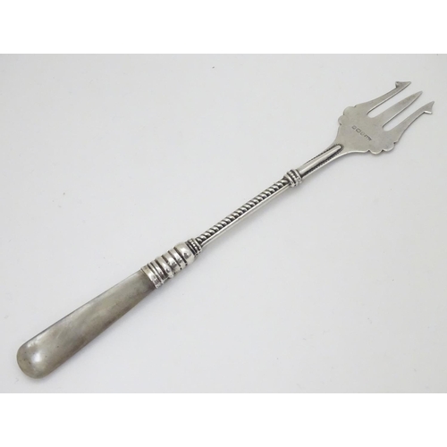 221 - A silver pickle fork hallmarked Birmingham 1921 maker Adie Lovekin Ltd with mother of pearl handle 6... 