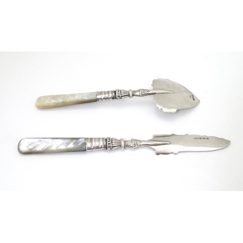 227 - A silver jam / preserve spoon with silver handle together with a matching butter knife. Hallmarked B... 