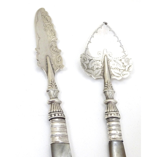 227 - A silver jam / preserve spoon with silver handle together with a matching butter knife. Hallmarked B... 