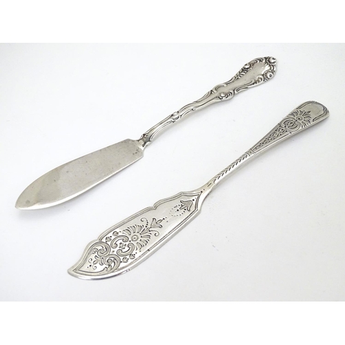 228 - 2 silver butter knives one hallmarked Sheffield 1905 maker W S Savage & Co. The other Birmingham 189... 