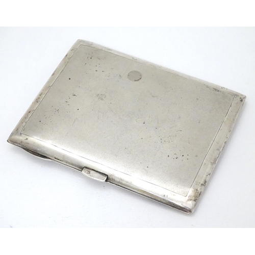 229 - A Sterling silver cigarette case with decoration to lid depicting figure and oxen ploughing the fiel... 