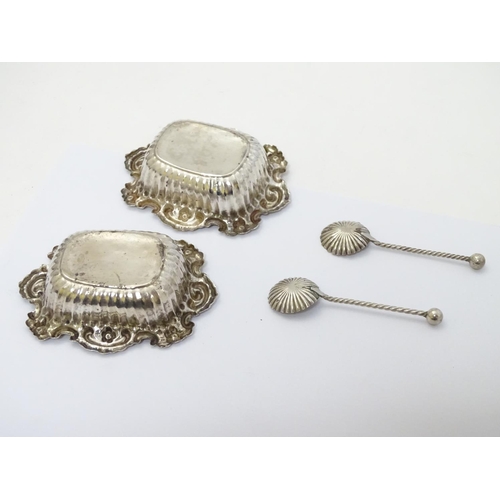 231 - A pair of silver salts hallmarked Chester 1900 together with a pair of salt spoons hallmarked 1901 m... 