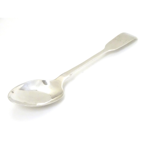 234 - A silver fiddle pattern teaspoon hallmarked London 1828 maker Clement Cheese. 5 ½'' long (14g)